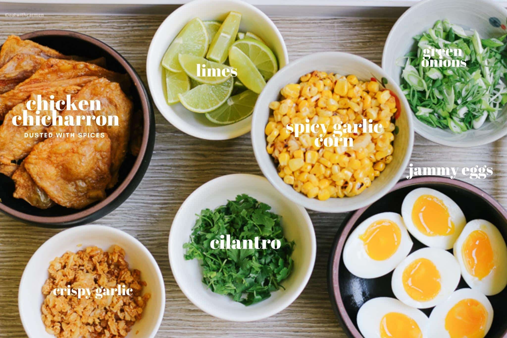 toppings for arroz caldo chicharron, lime, corn, soft boied eggs, cilantro, garlic 