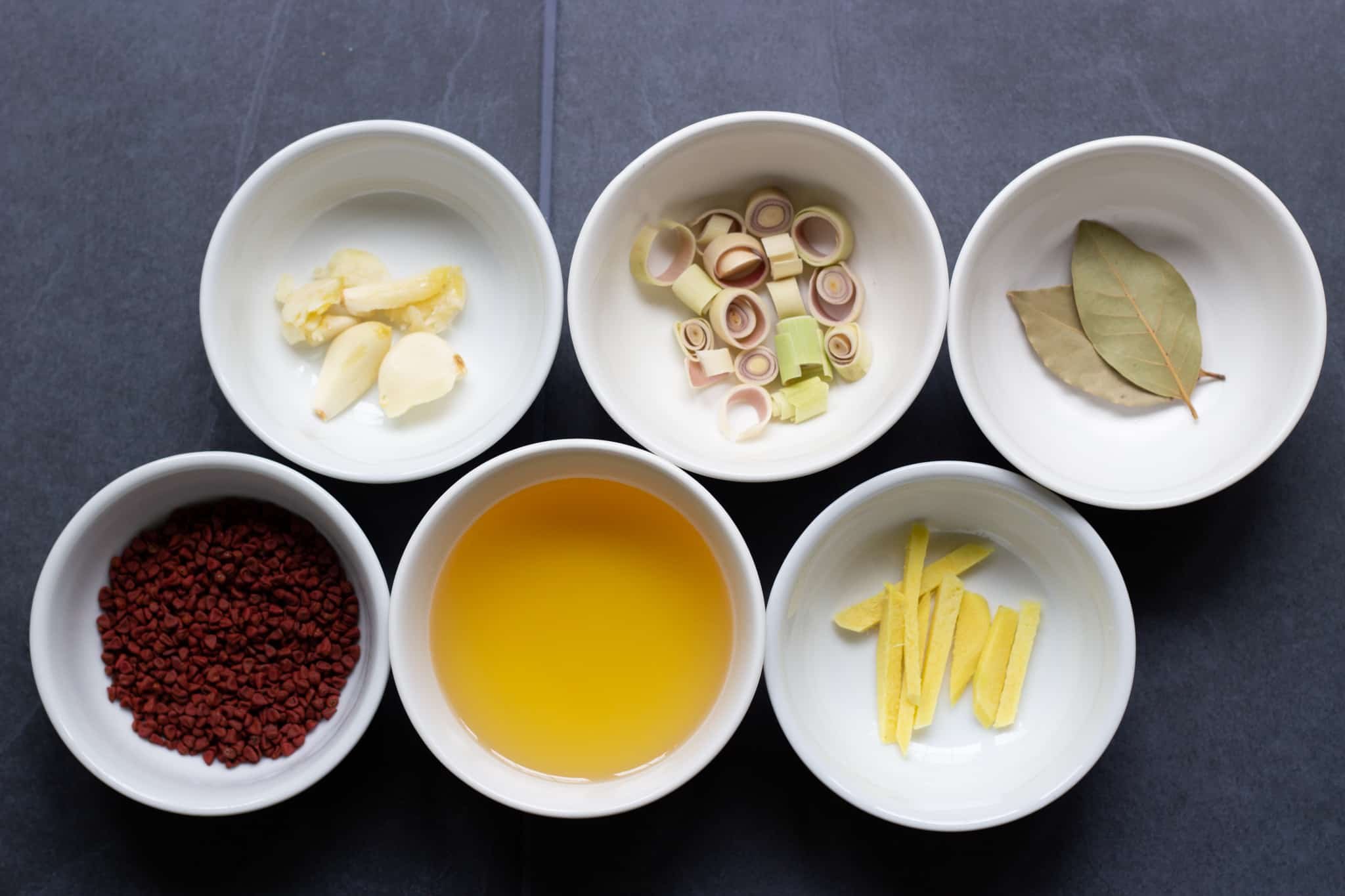 ingredients for annatto oil ingredients for annatto oil garlic, lemongrass, bay leaves, annatto seeds, ginger, neutral oil