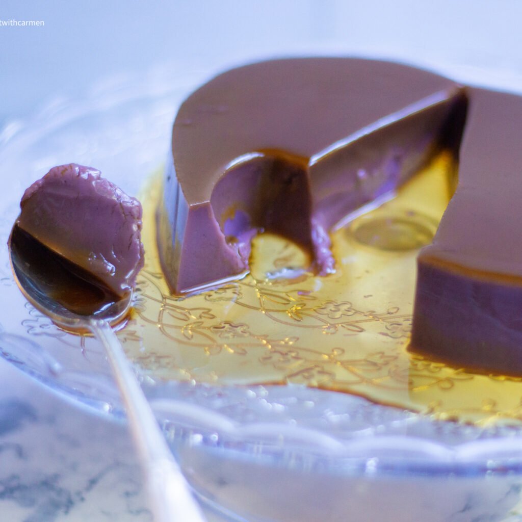 ube leche flan with spoon