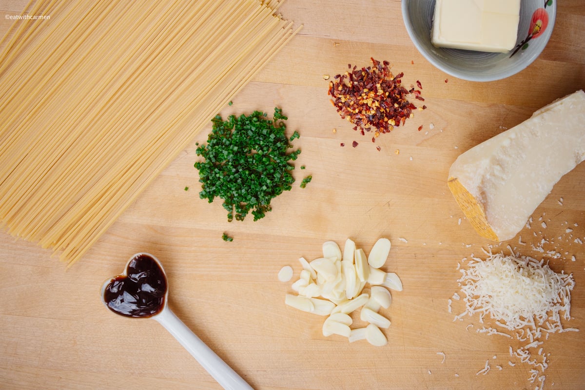 ingredients list. pasta, oyster sauce, chives, garlic, red chili flakes, parmensan cheese