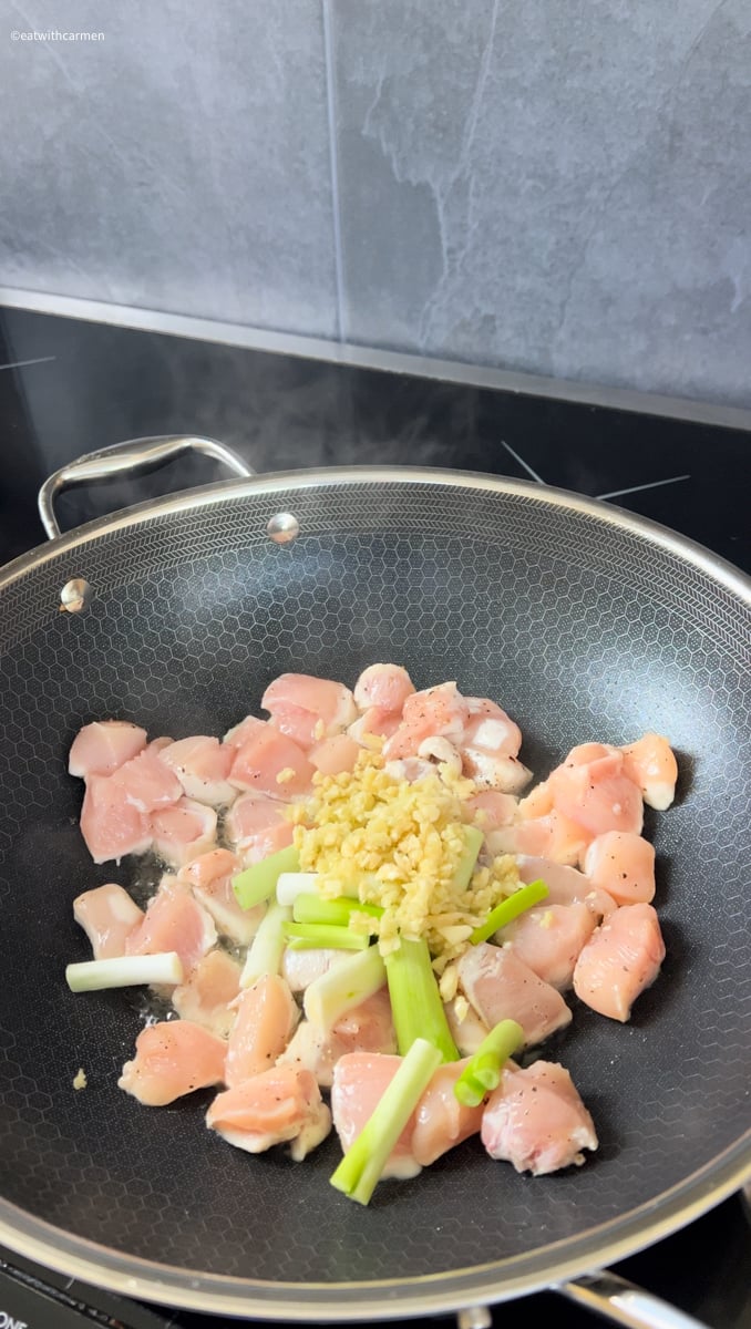 saute cashew chicken, garlic and green onion