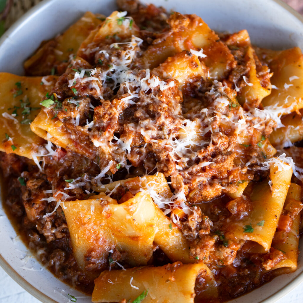 Three Meat Ragu The Best Braised Beef and Pork Ragu Recipe - Eat With Carmen