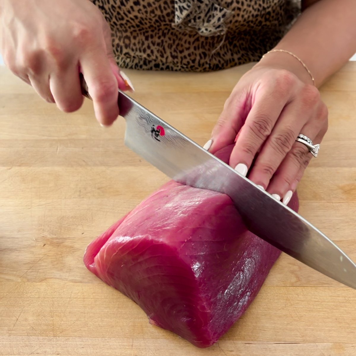 cut the sushi grade tuna tostadas