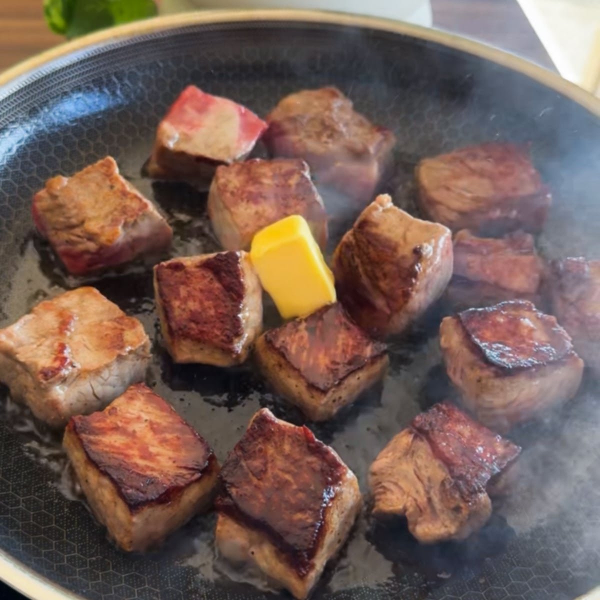 cook the steaks until medium rare and add butter.