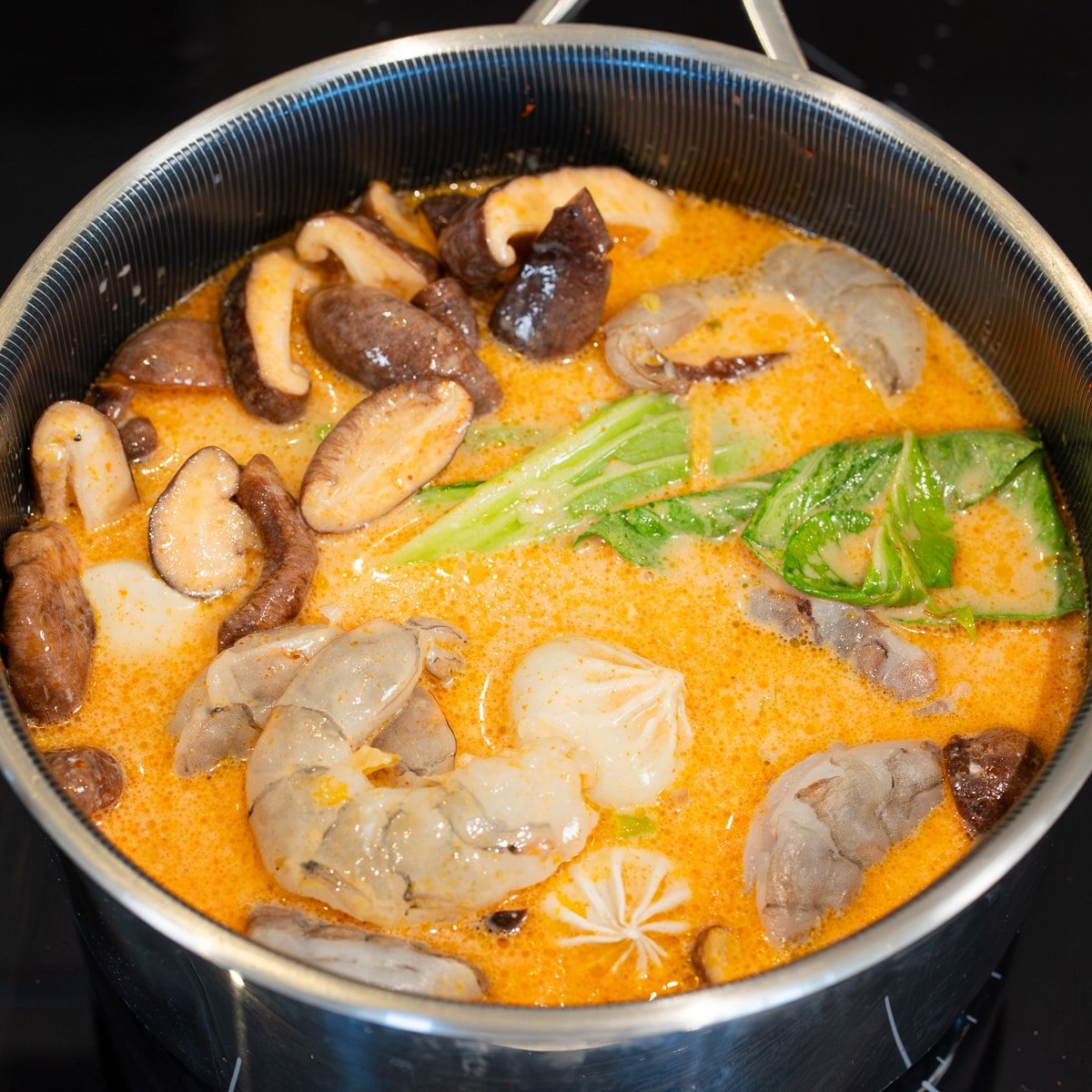 Red curry dumpling soup