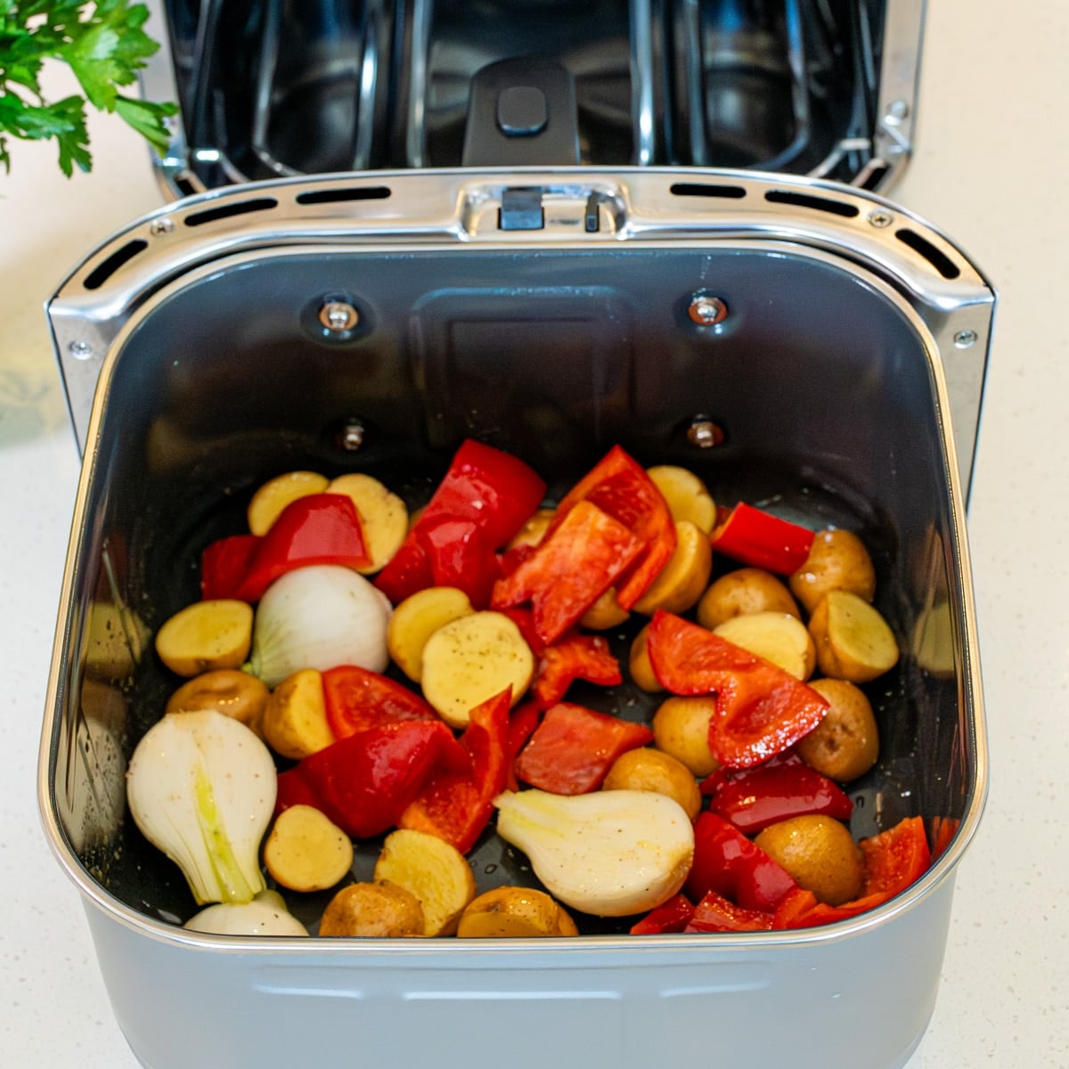 Potatoes and chicken in air fryer