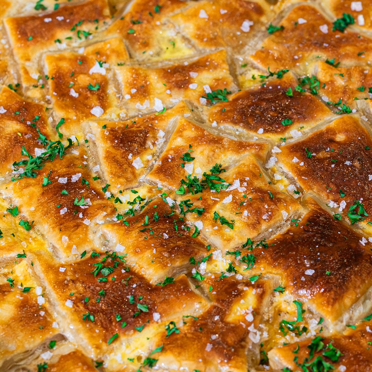 skillet chicken pot pie with leeks and puff pastry ready to serve